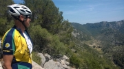April 2015: Eric, taking in the scenery at the flat bit on the Coll de Sa Batalla - there is a distant view...