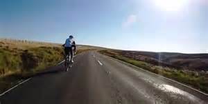 A cyclist ascending The Cragg.